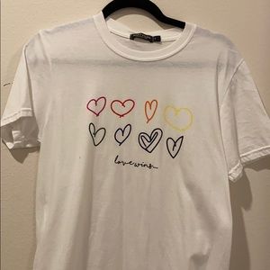 tee shirt that says love wins